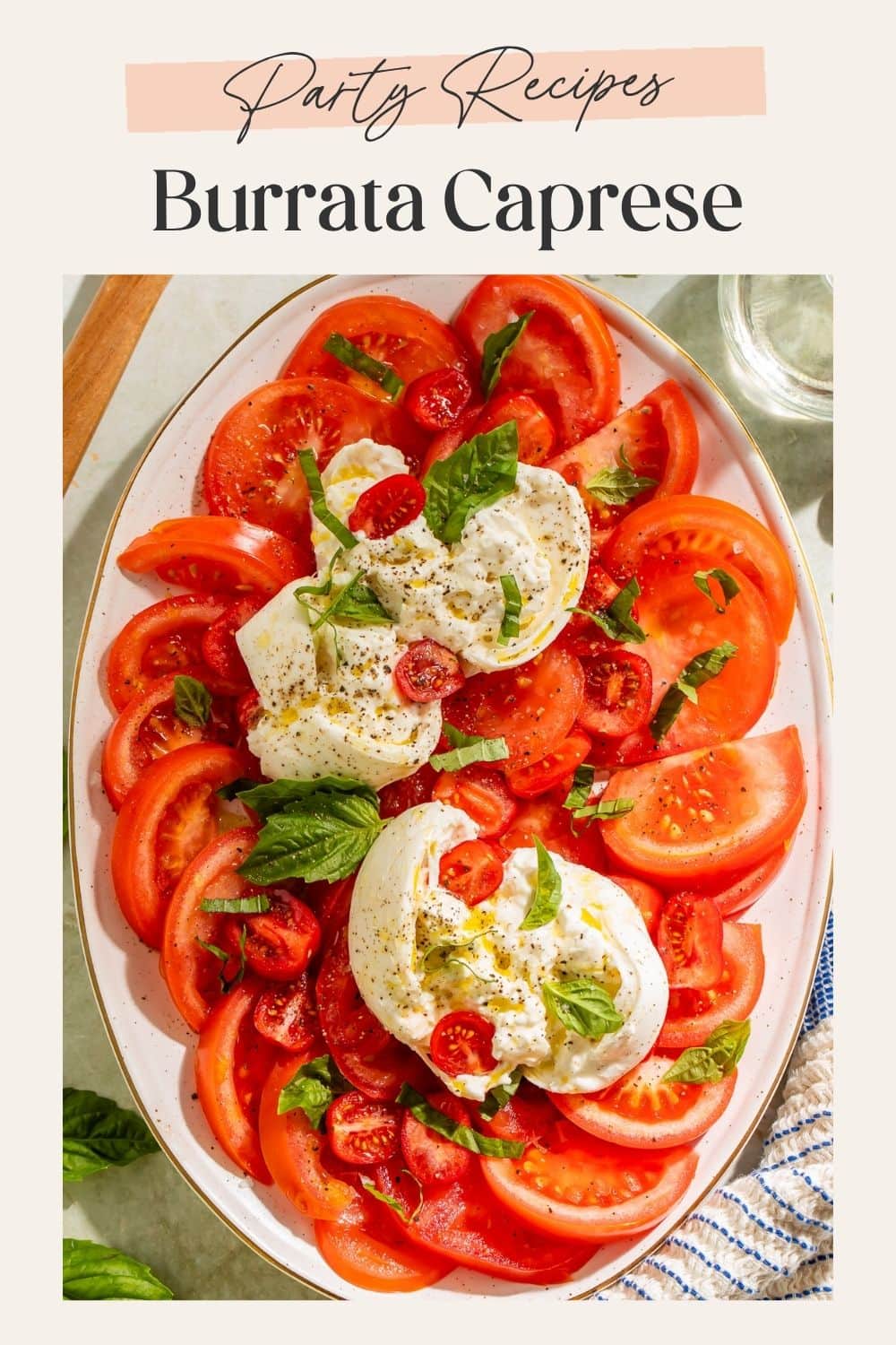 Party recipes pin showing full overhead burrata caprese salad platter on a gold-rimmed oval dish