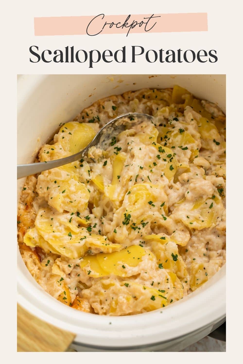 Pinterest pin showing crockpot scalloped potatoes being scooped with a spoon in a white slow cooker insert, with "Crockpot Scalloped Potatoes" text overlay