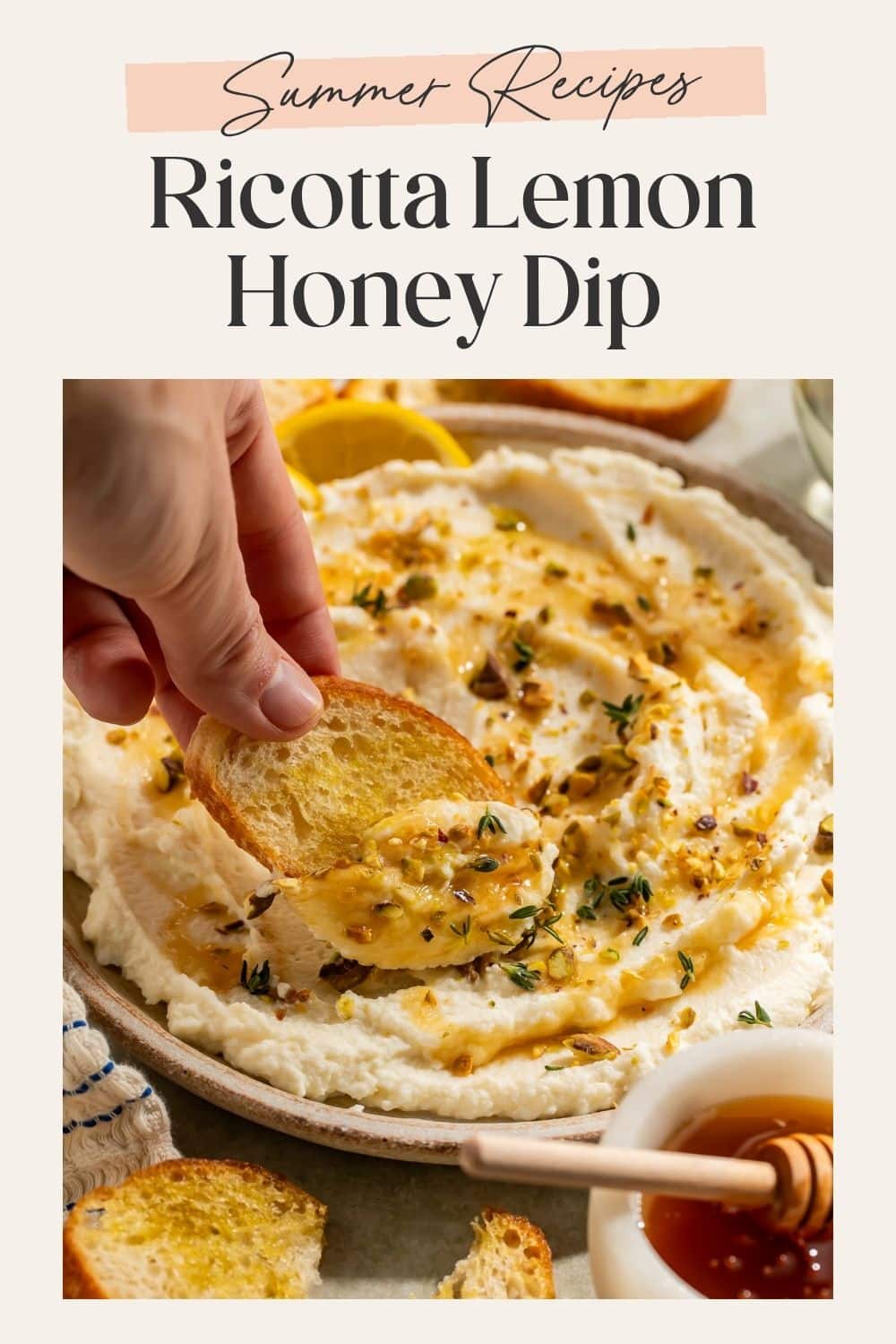 Pinterest pin with Summer Recipes Ricotta Lemon Honey Dip text header above an angled shot of a hand dipping a toasted baguette slice into a shallow ceramic bowl of whipped ricotta dip with a honey pot and baguette slices alongside