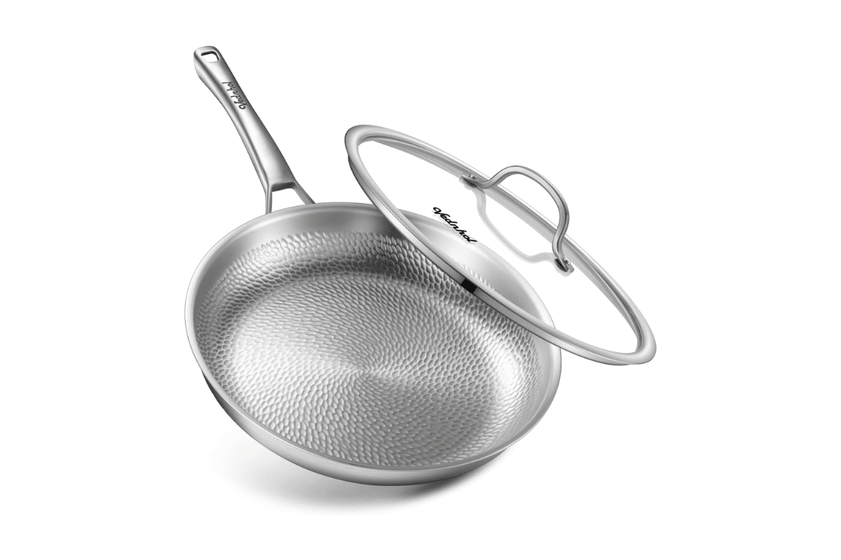 VEDNHOL hammered titanium frying pan with glass lid and stainless steel handle on white background