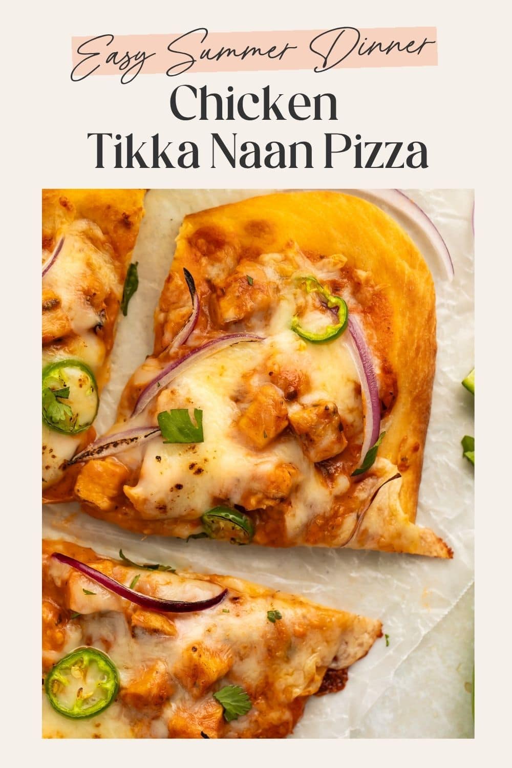 Close up of a slice of chicken tikka naan pizza garnished with jalapeno and red onion. There is a frame on the image with Pinterest-optimised text.