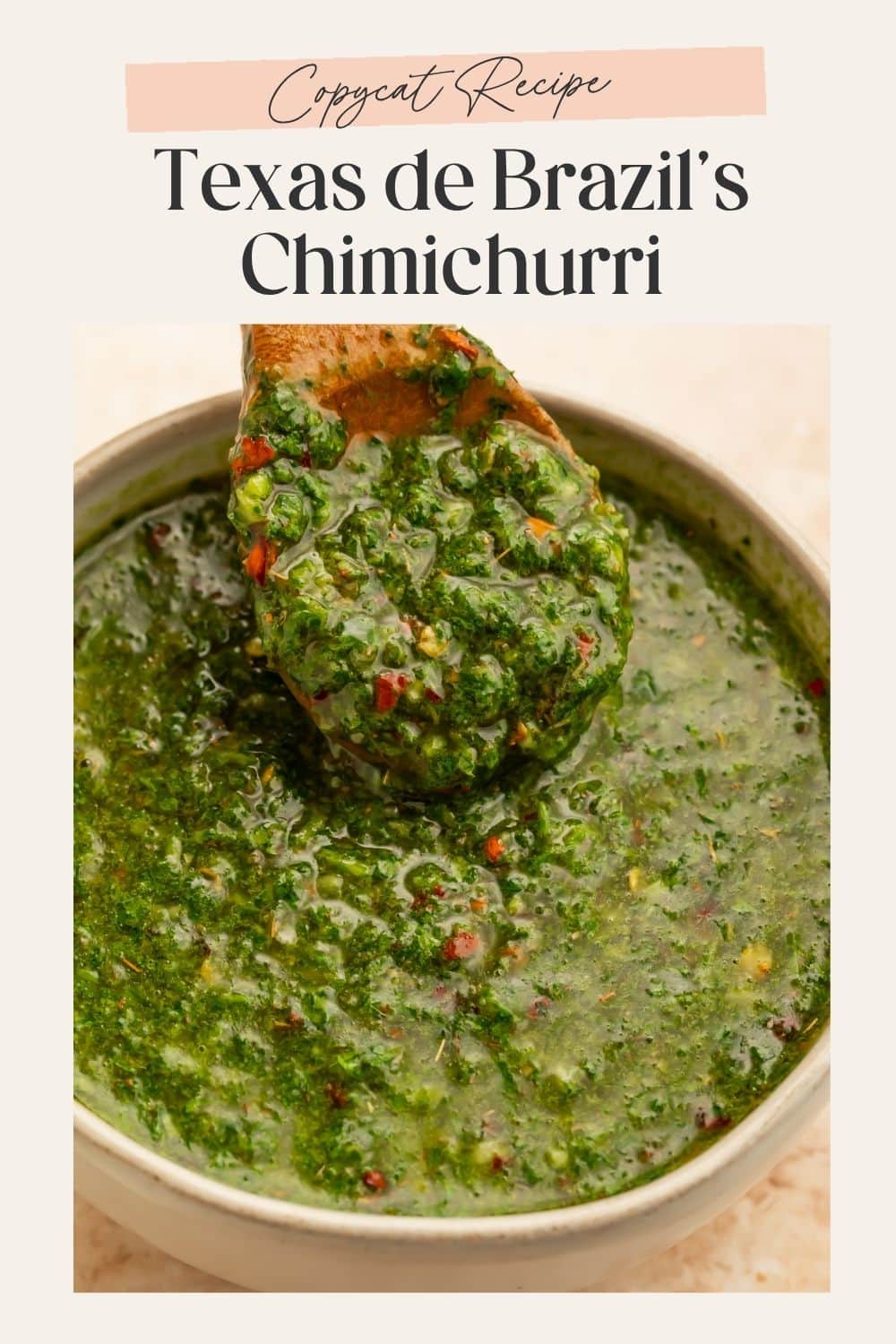Chimichurri with a wooden spoon lifting the sauce. A frame on the image has Pinterest-optimized text.