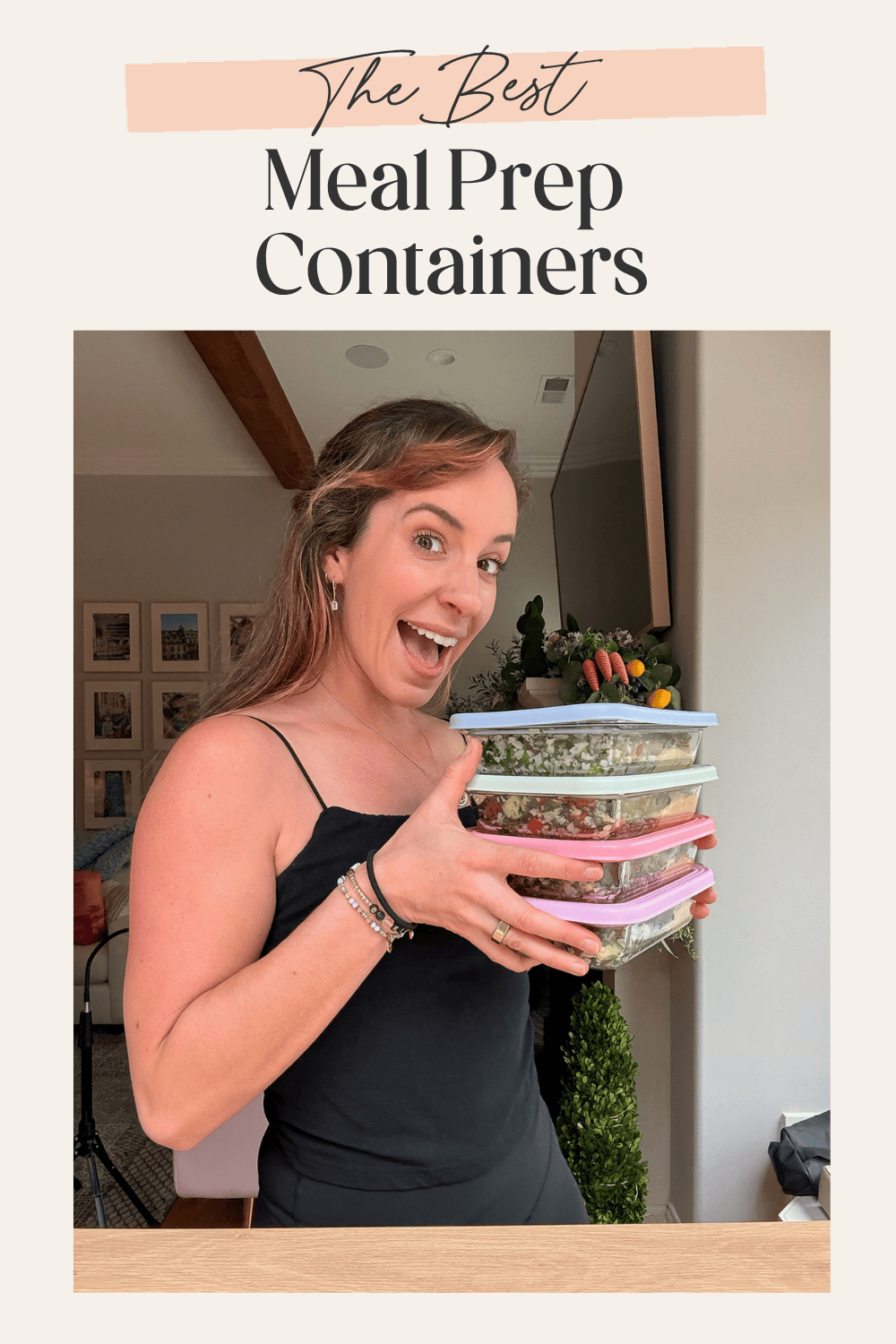 Pinterest pin graphic of smiling woman holding a stack of three glass meal prep containers with blue mint and pink lids filled with prepped meals