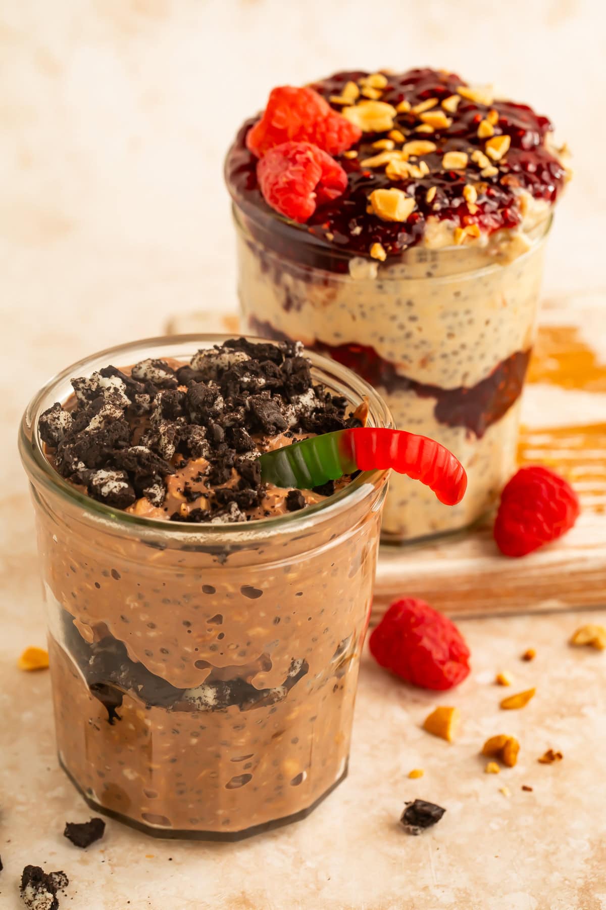 Chocolate and berry yogurt parfaits served in glass jars
