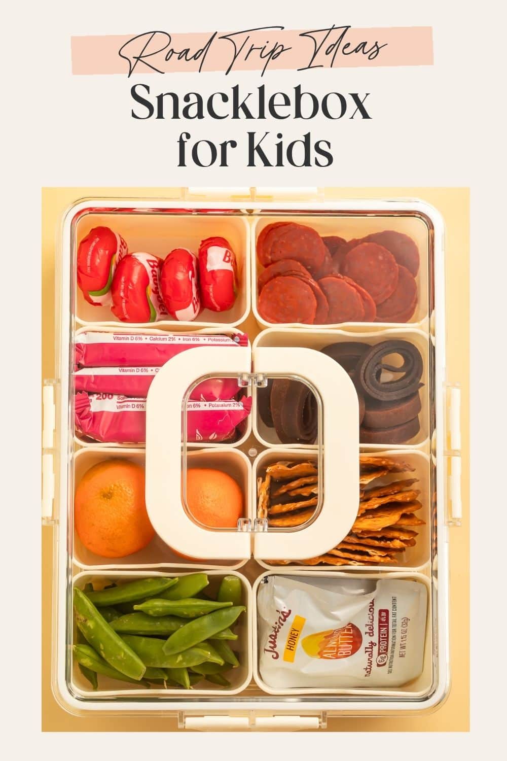 Lid-on kids snacklebox with a Pinterest-optimised frame on the image.