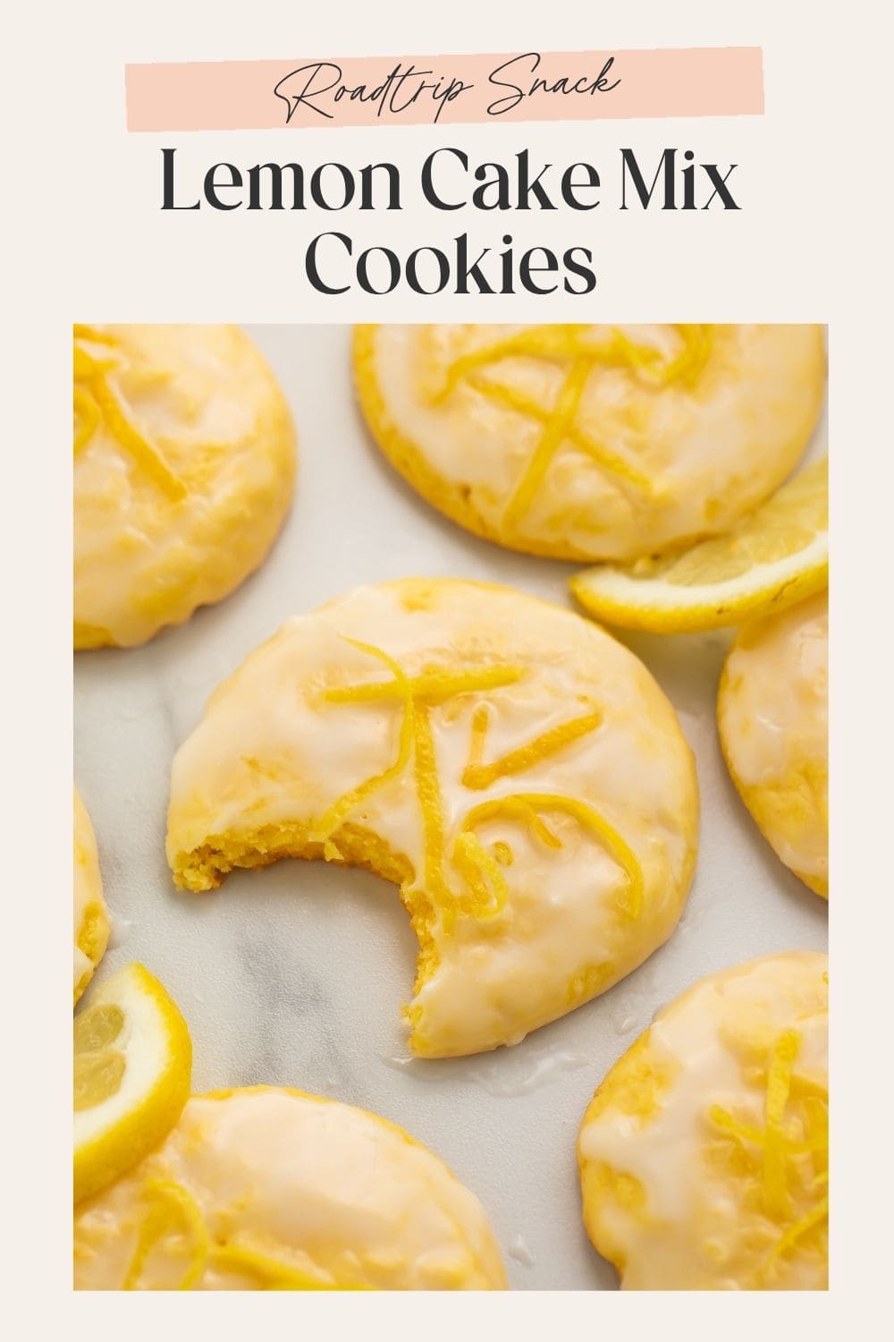 Close up of glazed lemon cookies with a bite taken out of the one in the middle. There is a very pale pink frame on the image with Pinterest-optimised text.