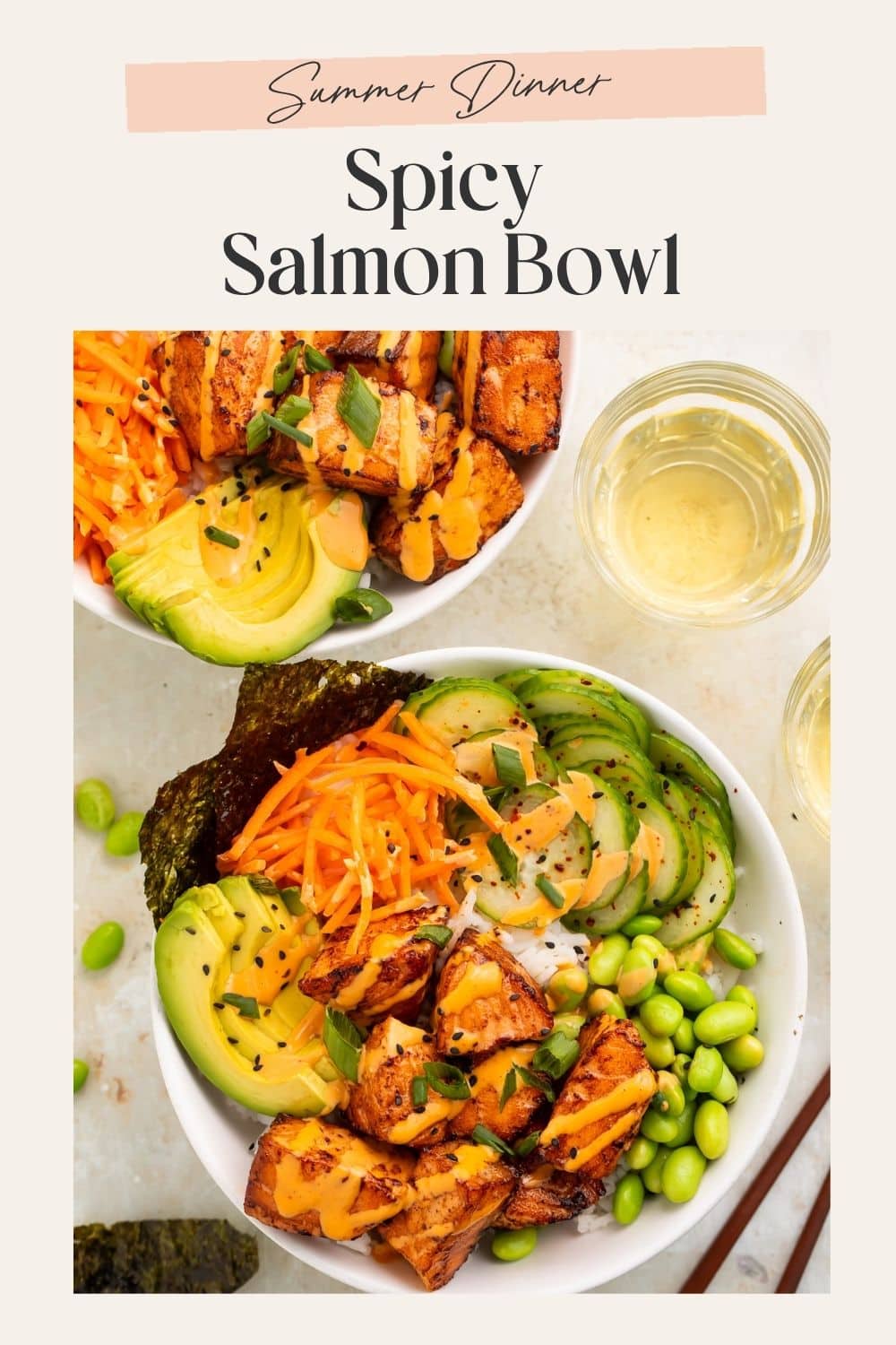 Two sushi bowls of spicy salmon and Asian-style vegetables. There is a frame on the image with Pinterest-friendly text.